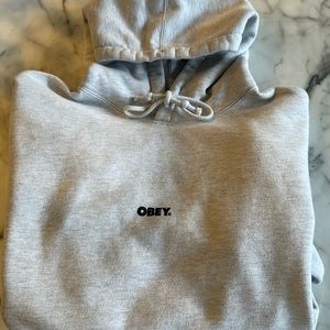 Soft gray Obey hooded sweatshirt with small logo